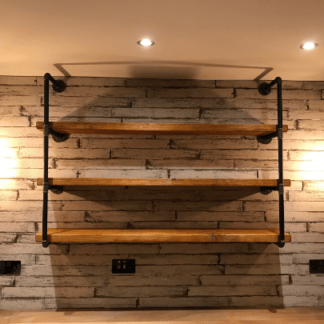 industrial steel pipe shelving unit with reclaimed wooden shelves