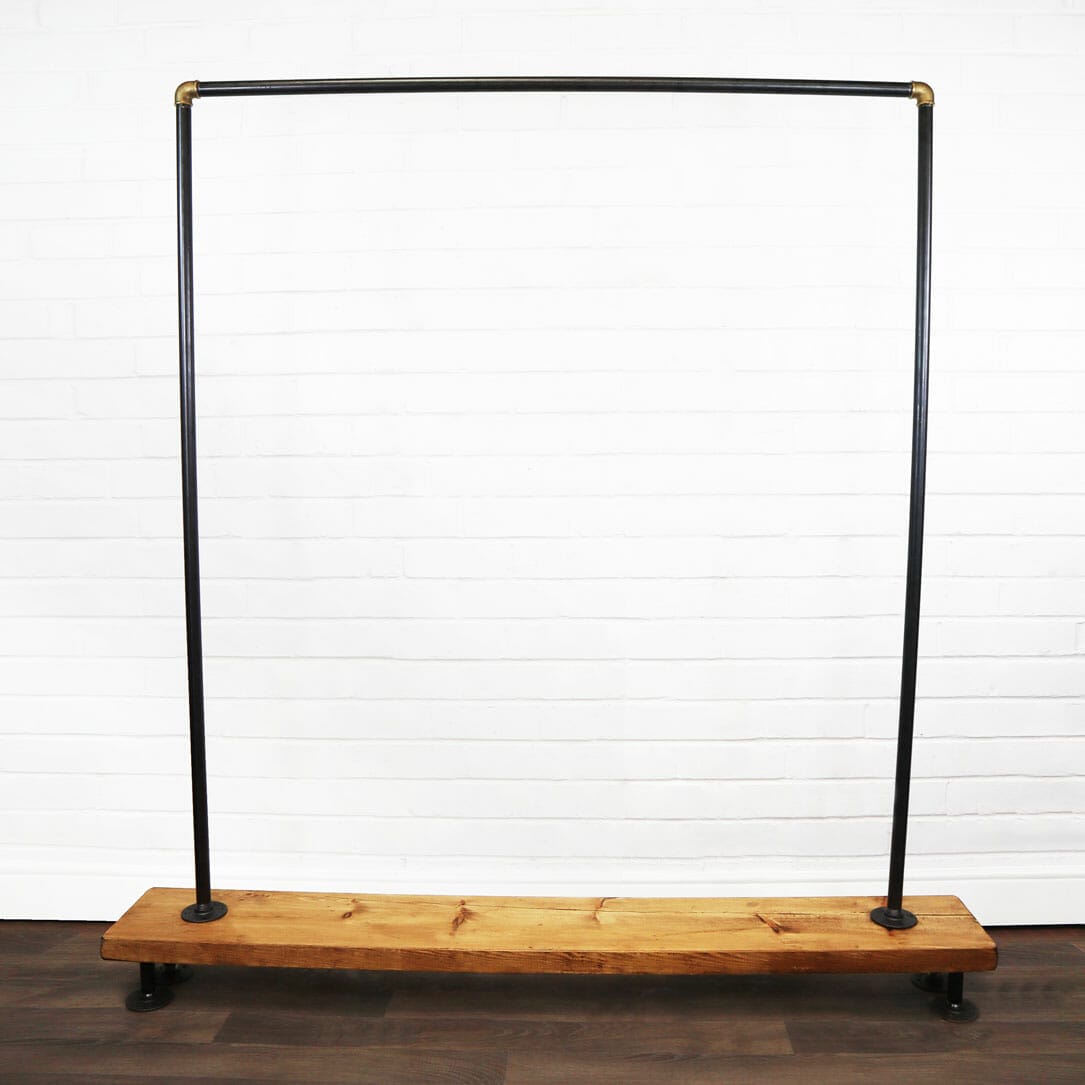 Free Standing Clothing Rail on Wooden Base Industrial Raw Steel And