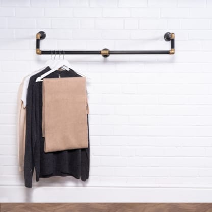 Wall-Mounted-Drop Down-Clothes-Rail-Industrial-Raw-Steel-and-Brass-Pipe-Style