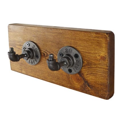 industrial pipe key hooks on oak frame