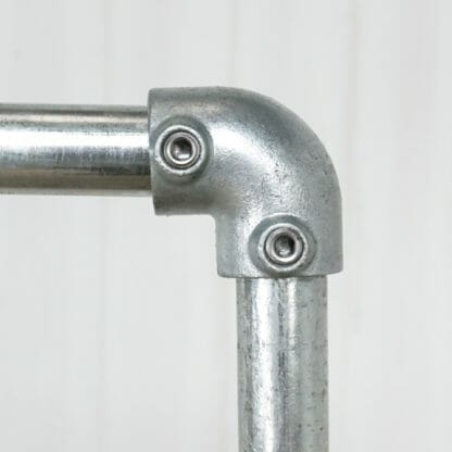 Industrial-silver-key-clamp-clothing-rail-with-wheels-5