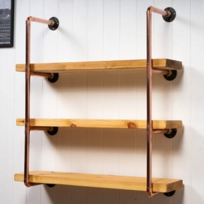 Wall-Mounted-Shelving-Unit-With-Reclaimed-Wooden-Shelves-Thick-Copper-Pipe-Style-5