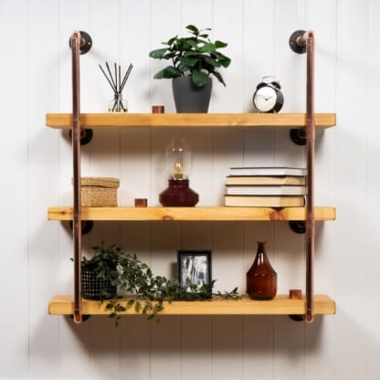Wall-Mounted-Shelving-Unit-With-Reclaimed-Wooden-Shelves-Thick-Copper-Pipe-Style